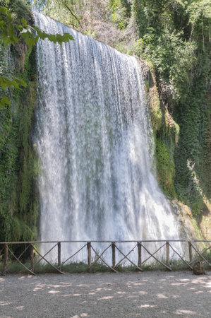 A beautiful foamy wide waterfall in the Monasterio de Piedra Natural Park in Zaragoza, Spainの写真素材