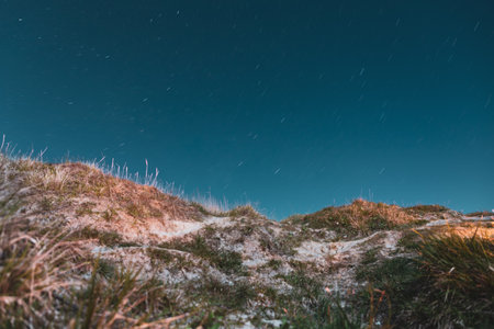 The Sandy dunes with the stars near Bowleaze cove on Weymouth beach, Dorset UKの写真素材
