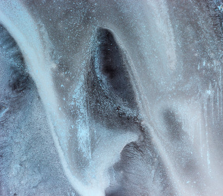 A closeup shot of an abstract textured blue wallpaperの写真素材