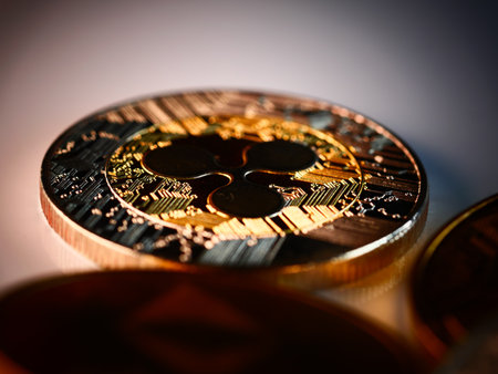 A closeup shot of gold and silver bitcoinsの写真素材