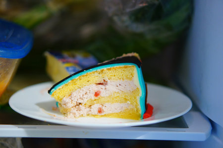 Strawberry cream cake on a plateの写真素材