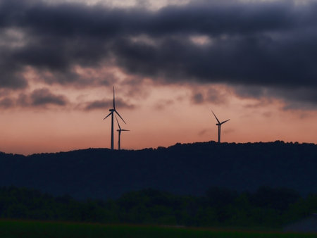 Wind farm in Fenner, New York with stormy sunriseの写真素材