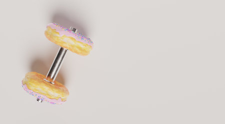 A top view of an exercise dumbbell with pink donuts on white background with space for textの写真素材