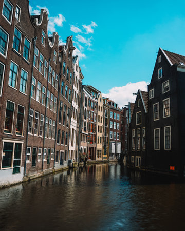 A closeup of beautiful Amsterdam Canal Houses in Netherlandsの写真素材