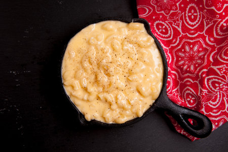 cast iron pan of macaroni and cheese, mac n cheese