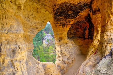 A beautiful view of the Klusfelsen near Halberstadt, with their caves in the sandstone rock. The Klusfelsen is a sandstone rock near Halberstadt, on tの写真素材