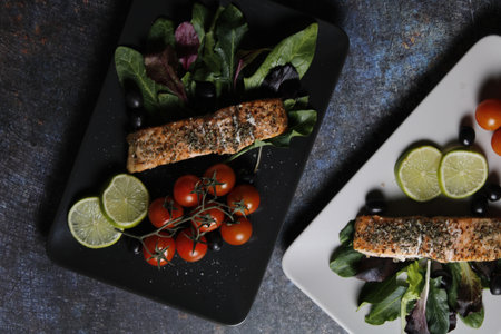 A closeup shot of grilled kebab with vegetables on the plateの写真素材