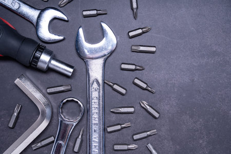 A closeup shot of working tools on gray backgroundの写真素材