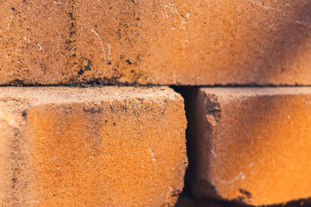 A closeup shot of a small hole on a brick wall