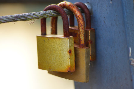 A closeup shot of love locks on a bridge in Marburg, Germanyの写真素材