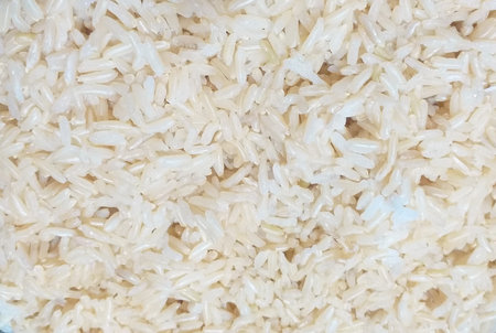 A closeup shot of uncooked purified rice grainsの写真素材