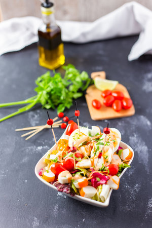 A closeup of the delicious and freshly made L'Oceane salad in a bowlの写真素材