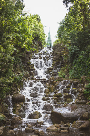 A vertical shot of a waterfall in Viktoriapark Berlin Germany