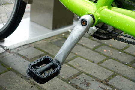 A closeup shot of the pedal of a bycicle