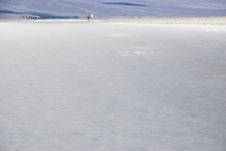 Barren salt lake desert landscape at Badwater Basin, Death Valley National Park - Californiaの写真素材