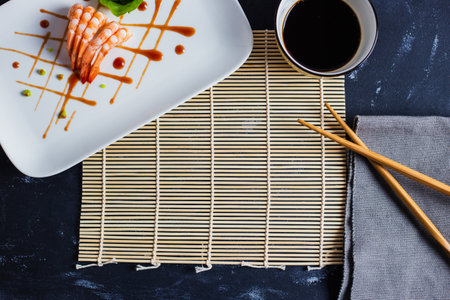 A top view of delicious Japanese shrimps with wasabi and soy sauce on the table