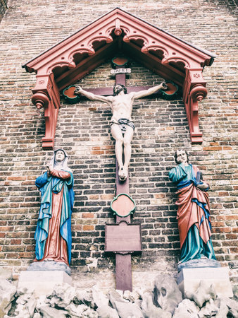 A low angle of the sculpture of the crucified Jesus Christ in Lissewege, Belgium