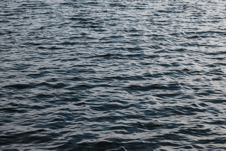 A closeup shot of ripples on the seaの写真素材