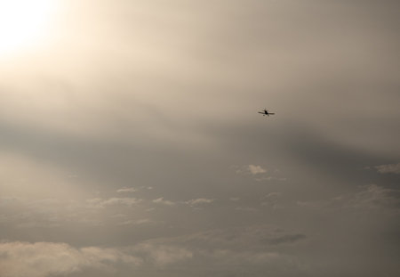 A helicopter flying in the sky at duskの写真素材