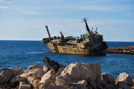 An old weathered grungy ship in a seaの写真素材