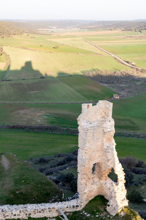 A vertical shot of medieval ruins in Calatanazor in Soria, Castilla y Leon, Spainの写真素材