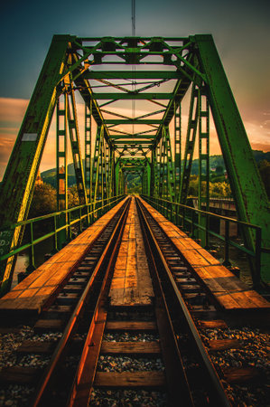 A symmetric perspective of a railroad bridge - vertical shotの写真素材