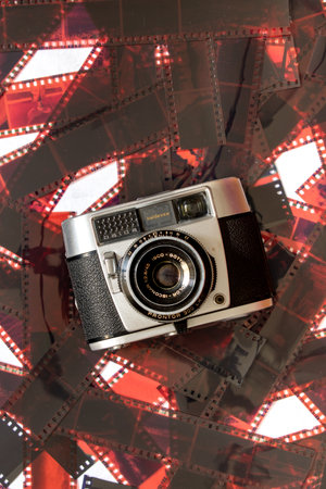 vintage analog camera on film photography backgroundの写真素材