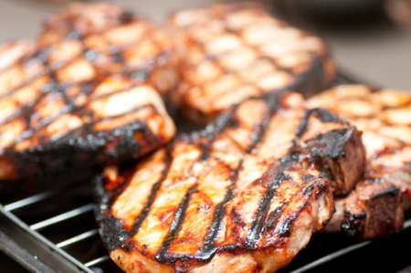 barbequed pork chops fresh grom the grill with delicious sauceの写真素材