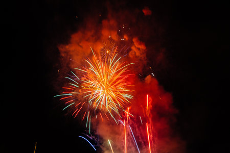 A scenic view of fireworks illuminates the sky with a dazzling displayの写真素材