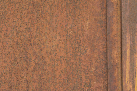 A closeup shot of an old and rustic metal-painted door texture.