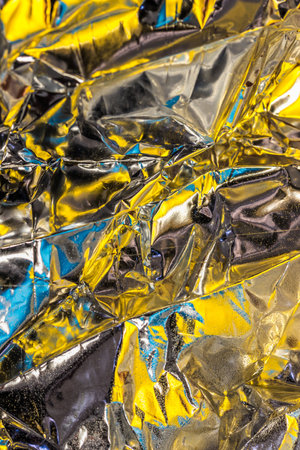 A vertical shot of wrinkled metallic textureの写真素材