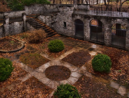 Sunken garden in early spring on a rainy dayの写真素材