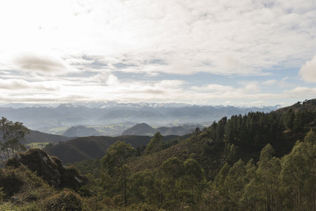 A beautiful scenery of a mountainous landscape with greenery in Asturias, Spainの写真素材