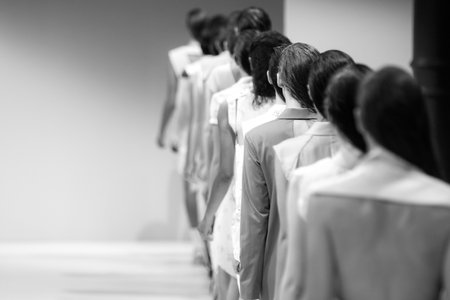 models walking a catwalk during a fashion showの写真素材