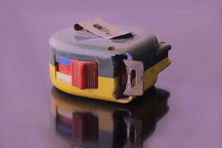 A closeup shot of a measurement on the purple backgroun