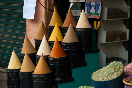 The Moroccan colorful spice cones at a bazaarの写真素材