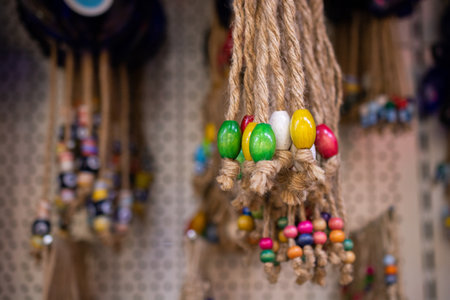 A closeup shot of ropes with colorful beadsの写真素材