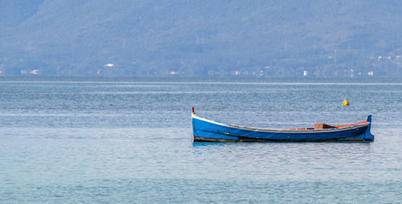 A closeup shot of a fishing boat in a bayの写真素材