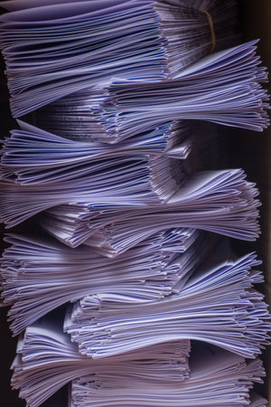 A vertical shot of stack of papers pattern