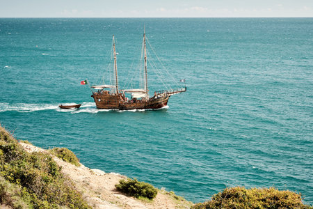 A ship sailing in the blue sea in Portugal