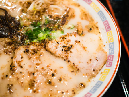 A closeup shot of a bowl with delicious Japanese ramenの写真素材