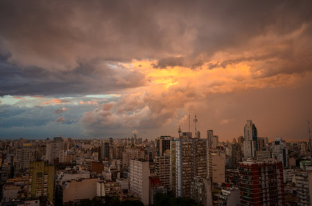 dramatic clouds over Buenos Aires city at sunset with Rio de la Plata river in the back, Argentina