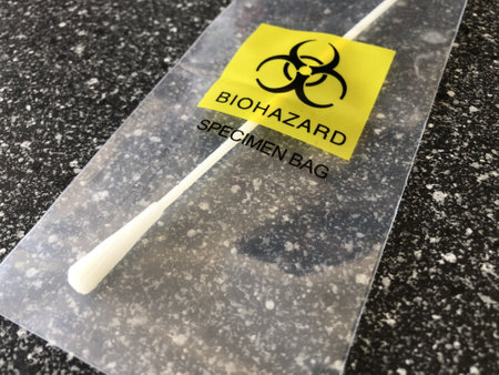 A closeup shot of a cotton swab in a biohazard specimen bag