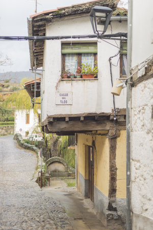 A vertical shot of a street of the medieval city of Hervas Caceres Extremadura Spain