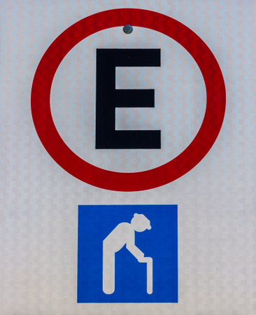 A closeup shot of a sign showing a parking lot for the elderlyの写真素材