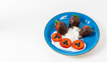 strawberries with chocolate on white backgroundの写真素材