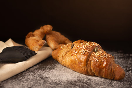 The homemade delicious croissants on a kitchen tableの写真素材