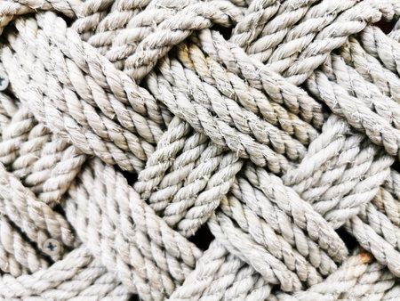 A closeup shot of interwoven wool ropesの写真素材