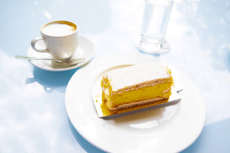 Coffee with Cake and Glass of Water in Switzerland.の写真素材