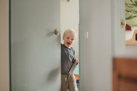 A closeup shot of a boy at homeの写真素材
